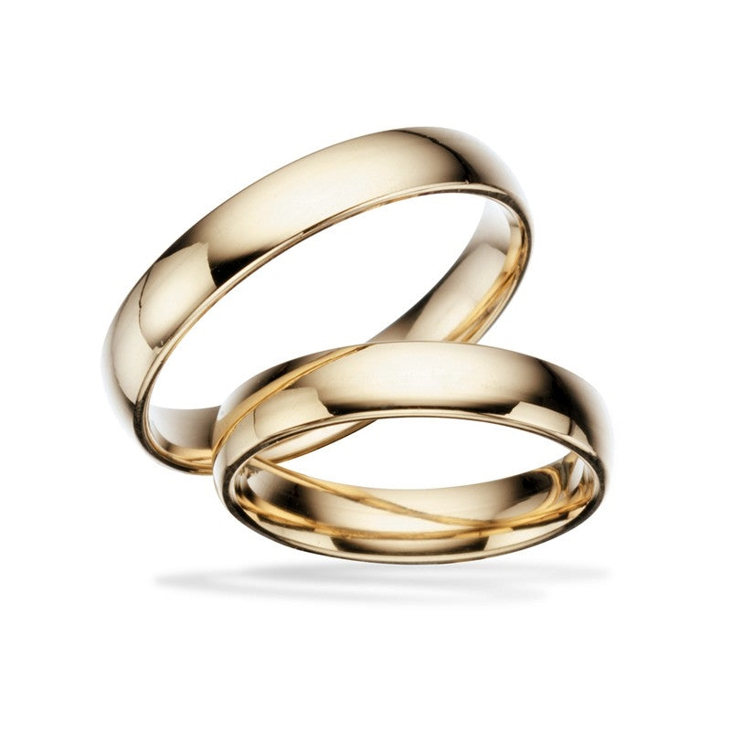 Scrouples vielsesringe i 8 eller 14 karat guld med blank overflade, 4 mm brede.